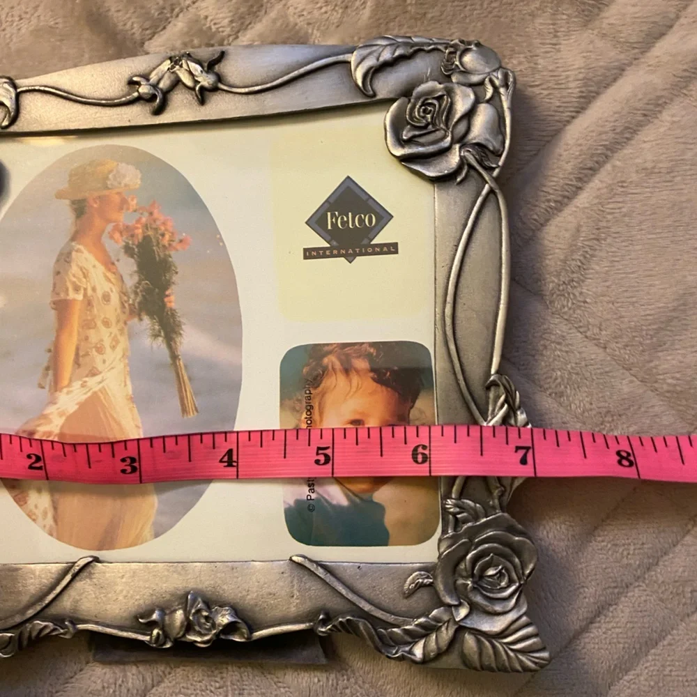 Fetco International Silver Floral Photo Frame stand is tight.  OSP